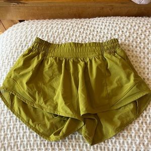 greenish yellow lulu shorts size 2!